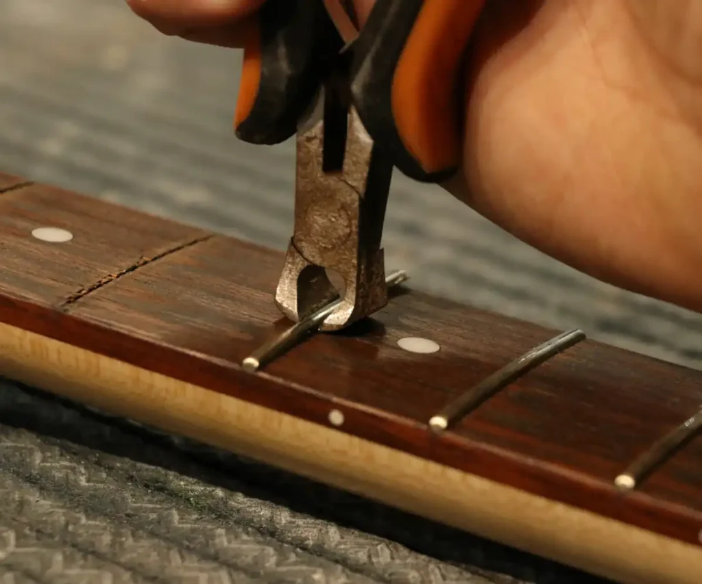 troca de trates luthier